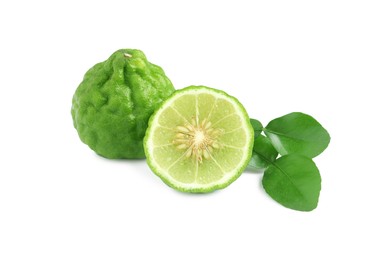 Photo of Fresh ripe bergamot fruits and green leaves on white background