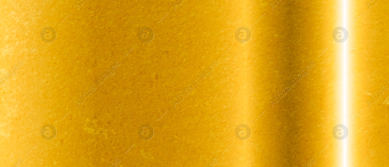 Image of Shiny gold surface as background, closeup view