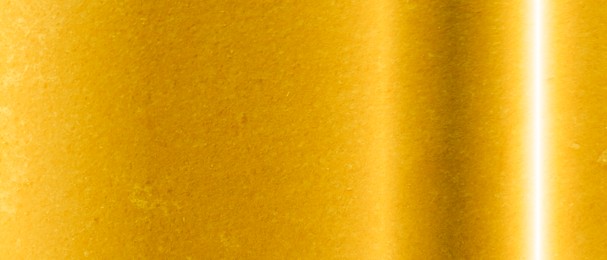 Image of Shiny gold surface as background, closeup view