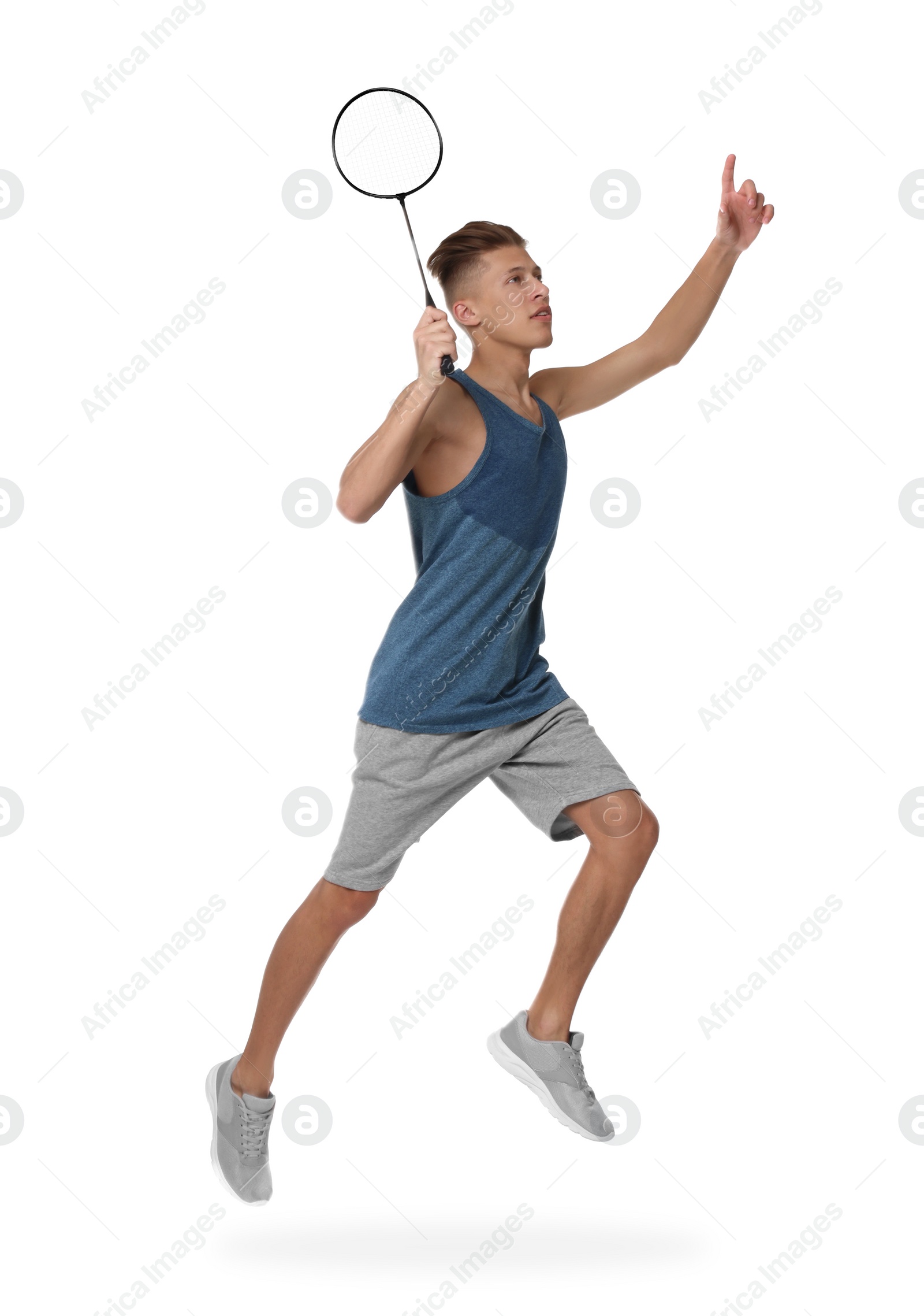 Photo of Young man playing badminton with racket on white background