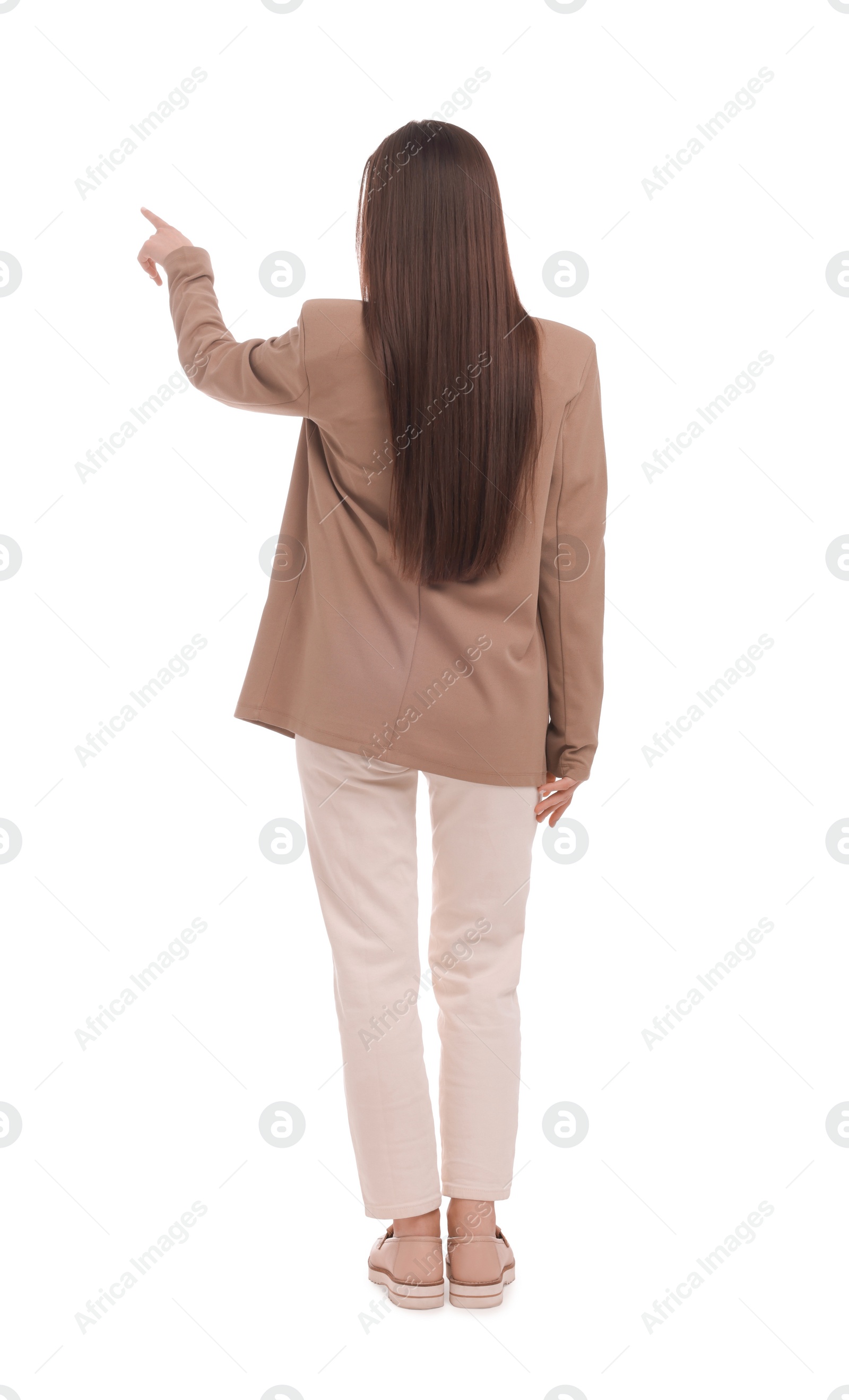 Photo of Businesswoman in suit pointing at something on white background, back view