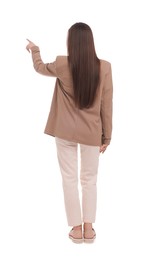 Photo of Businesswoman in suit pointing at something on white background, back view