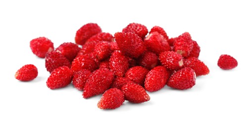 Photo of Ripe red wild strawberries isolated on white