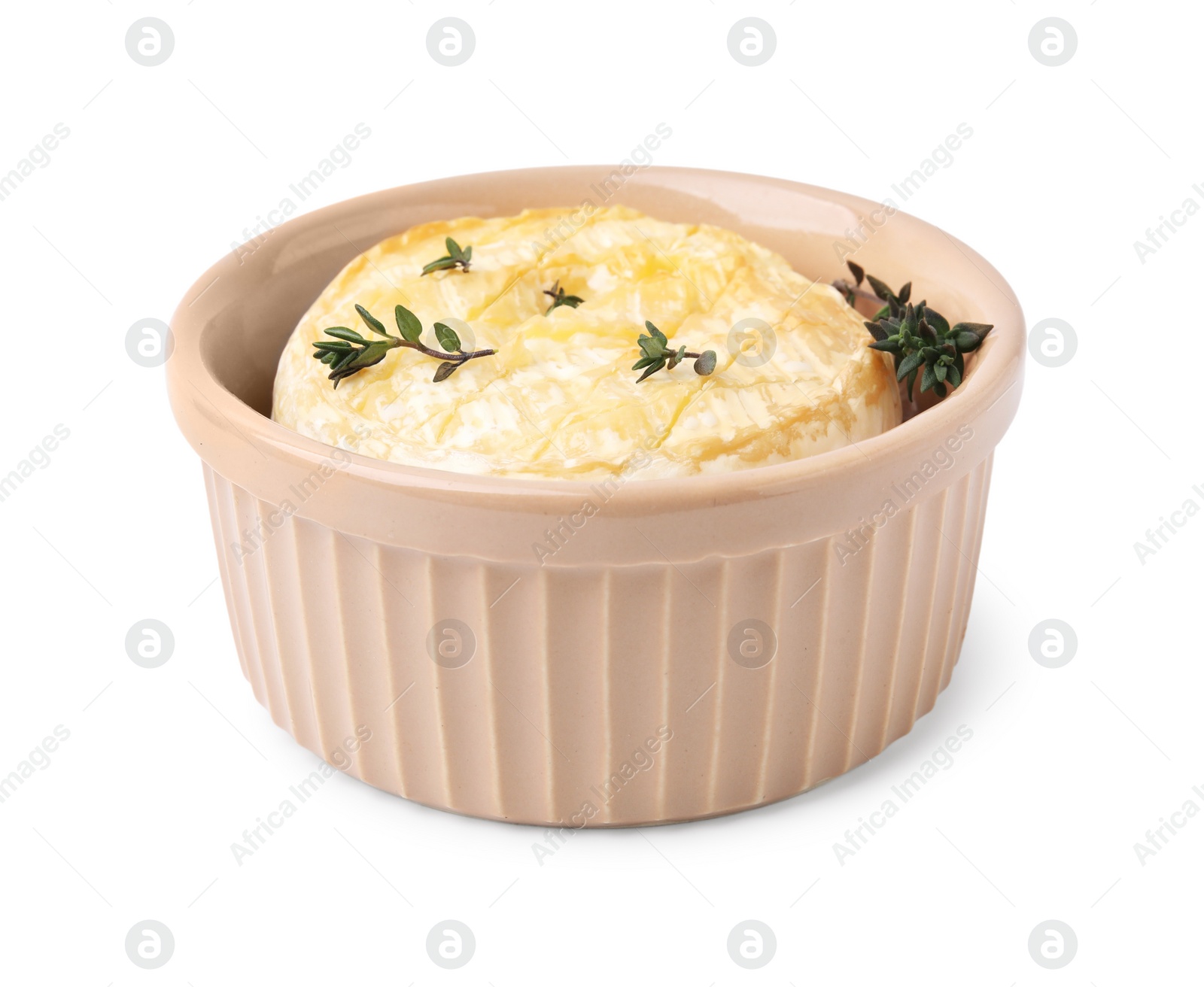 Photo of Tasty baked camembert and thyme in bowl on white background