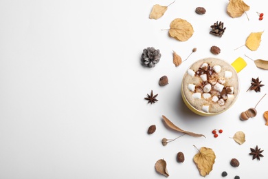Photo of Composition with cup of hot drink on white background, top view. Cozy autumn atmosphere