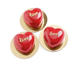 Photo of St. Valentine's Day. Delicious heart shaped cakes isolated on white, top view