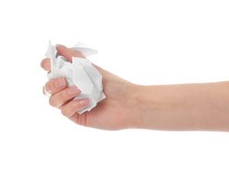 Photo of Woman crumpling paper against white background, closeup. Generating idea