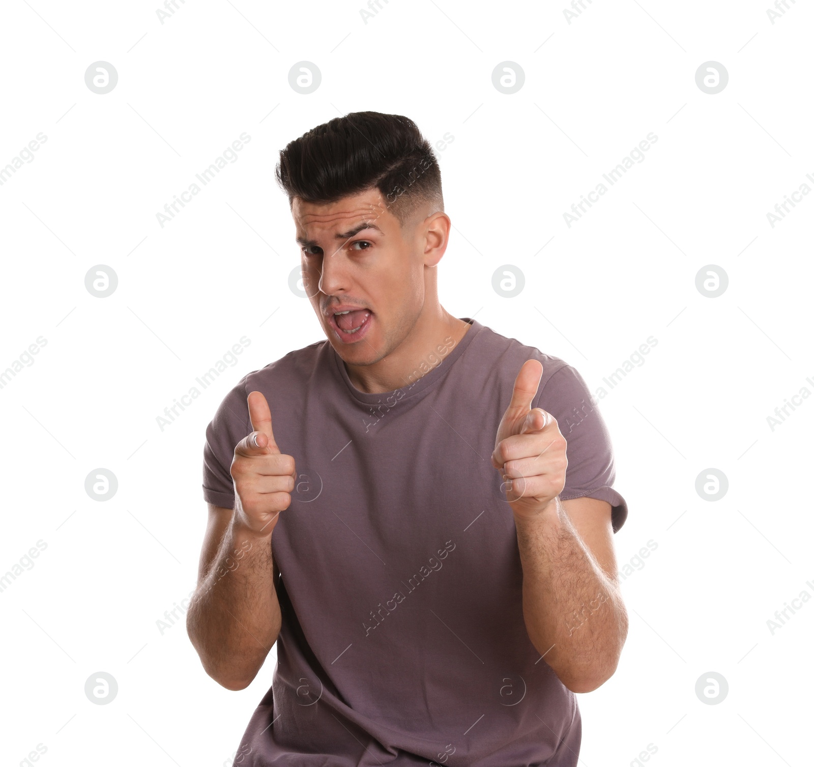 Photo of Portrait of emotional man on white background. Personality concept