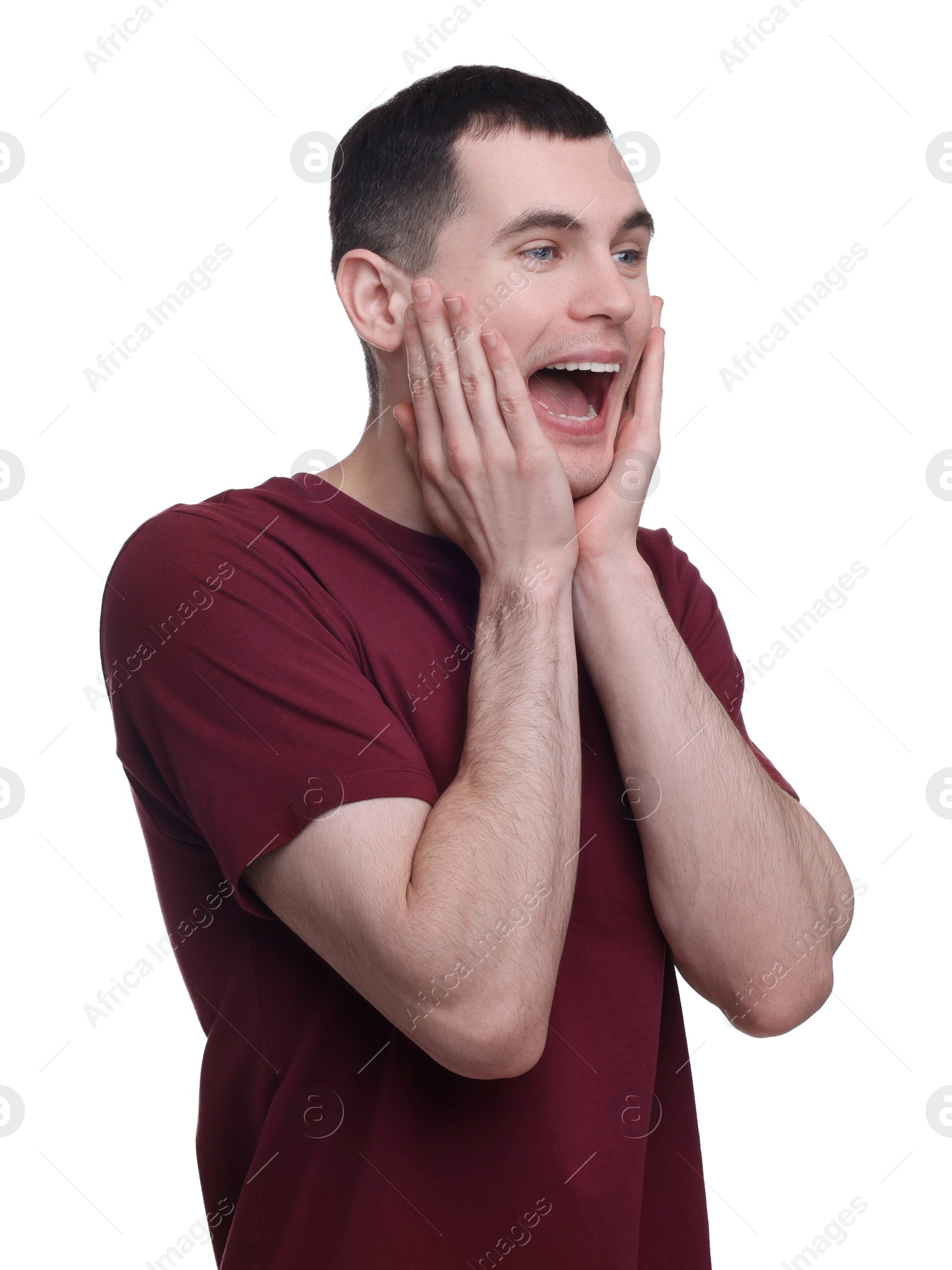 Photo of Portrait of surprised man on white background