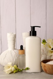 Photo of Beautiful composition with different spa products on light gray table