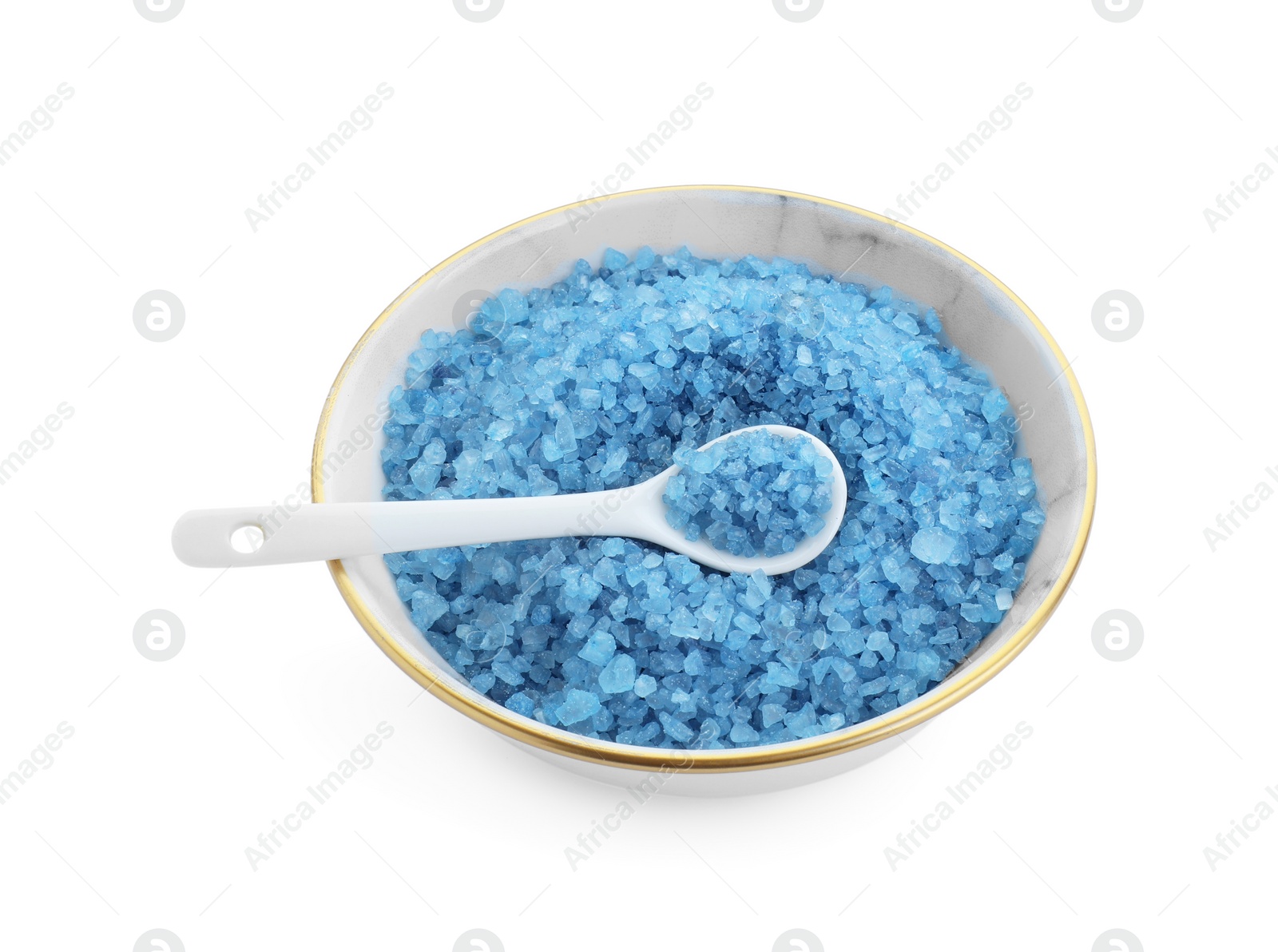 Photo of Bowl with blue sea salt isolated on white