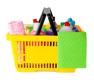 Yellow shopping basket with different household chemicals on white background