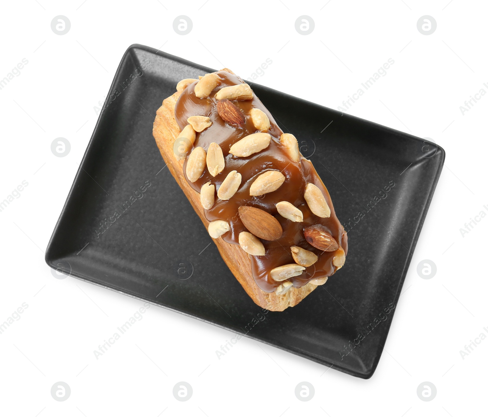 Photo of Round croissant with chocolate paste and nuts isolated on white, top view. Tasty puff pastry