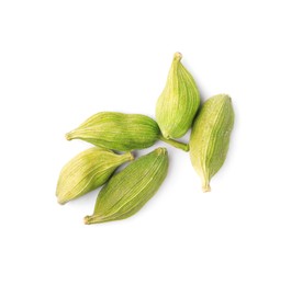 Pile of dry green cardamom on white background, top view
