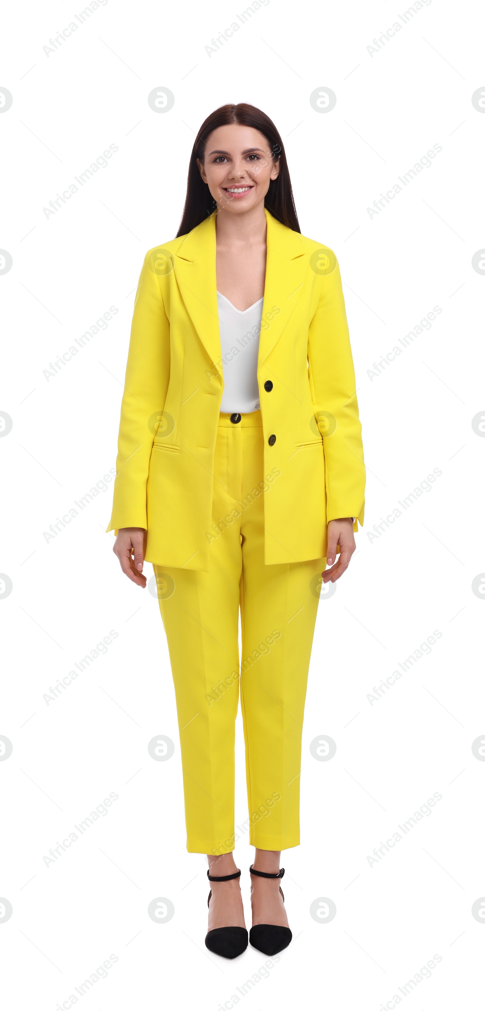 Photo of Beautiful happy businesswoman in yellow suit on white background