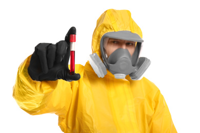 Photo of Man in chemical protective suit holding test tube of blood sample on white background. Virus research