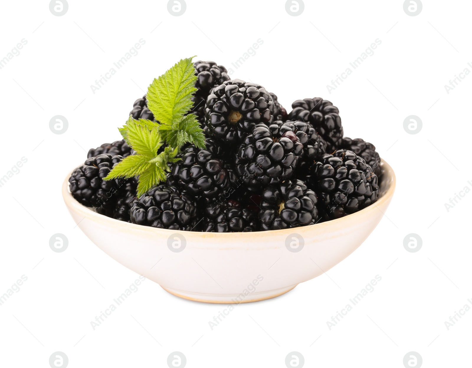 Photo of Tasty ripe blackberries in bowl isolated on white