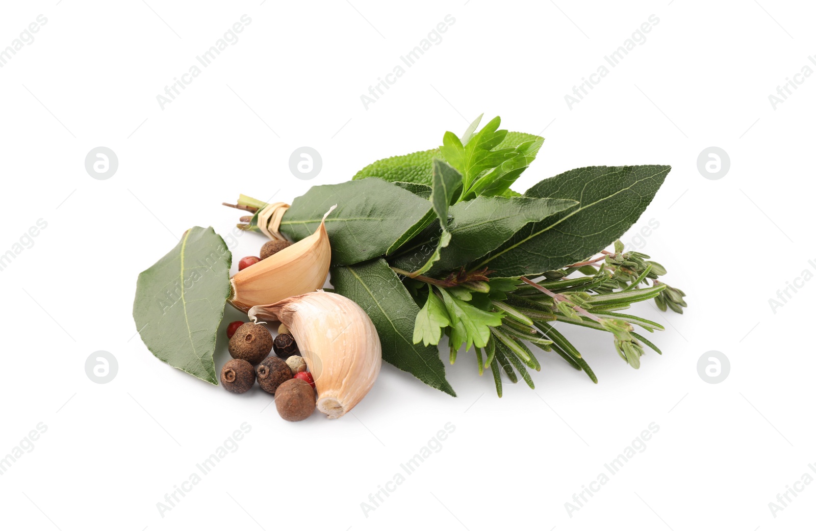 Photo of Bundle of aromatic bay leaves, different herbs and spices isolated on white