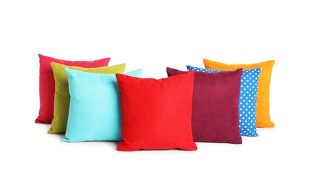 Different colorful decorative pillows on white background