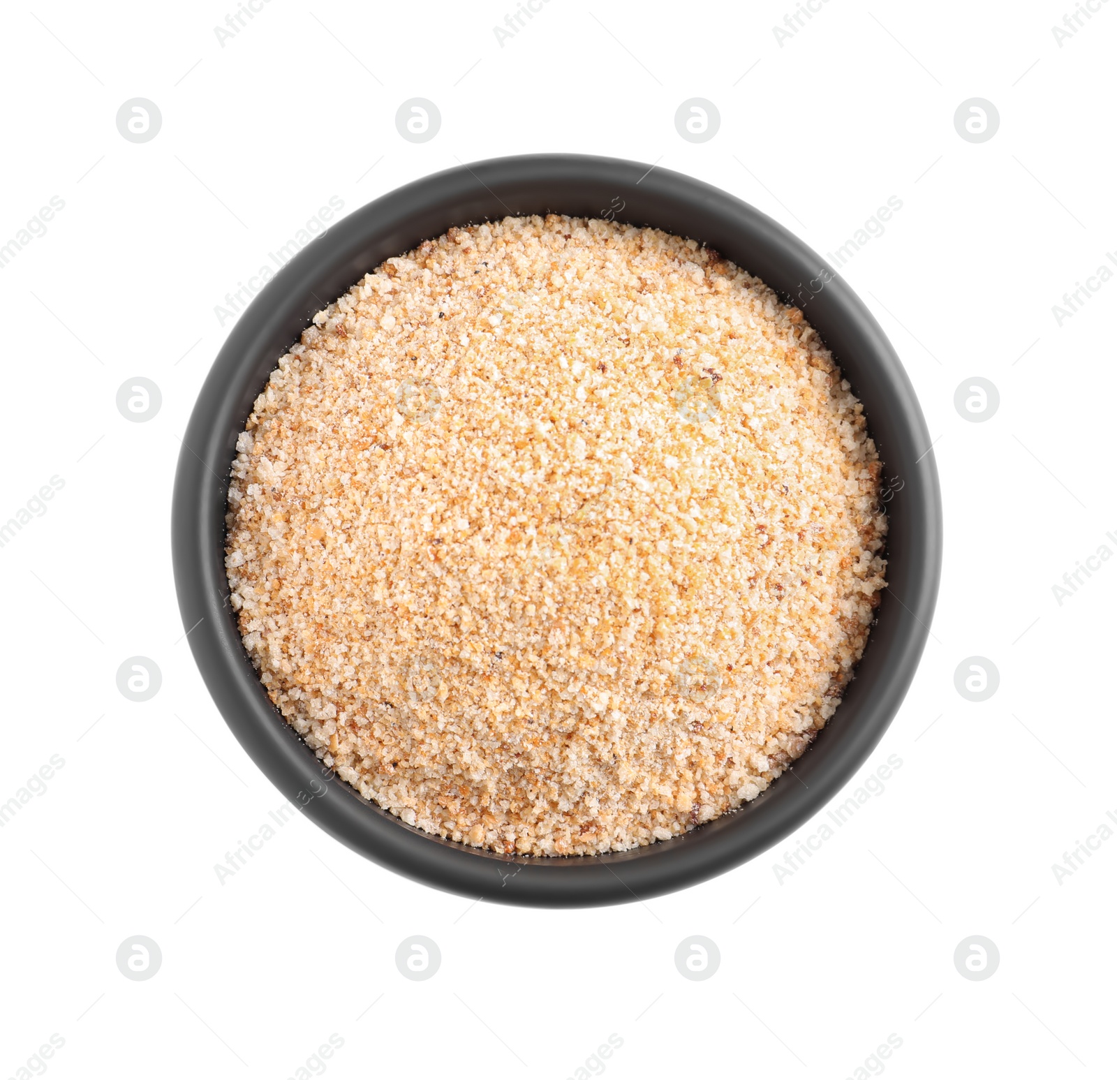 Photo of Fresh bread crumbs in bowl isolated on white, top view