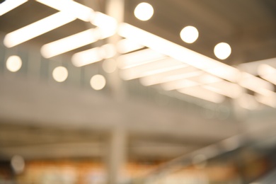 Blurred view of modern shopping mall interior