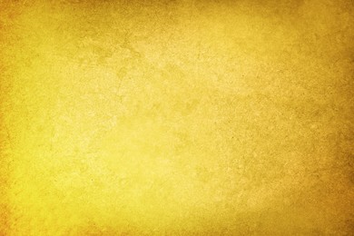 Image of Golden textured surface as background, closeup view