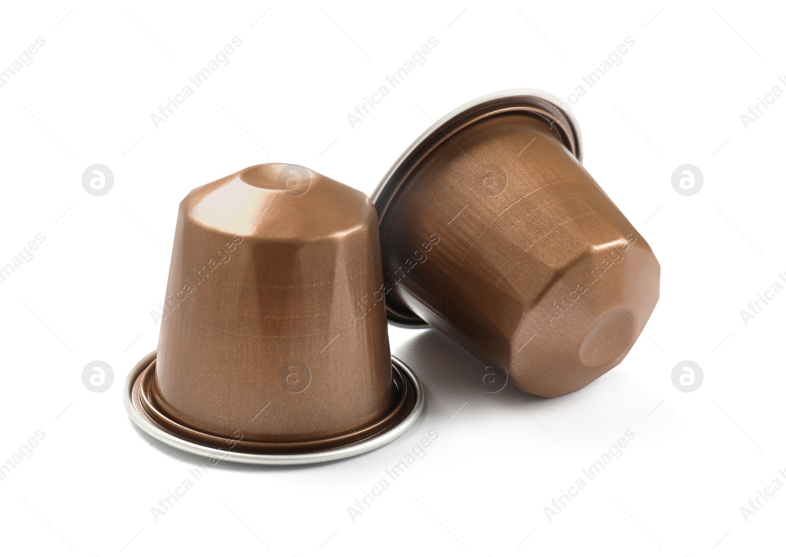 Photo of Two plastic coffee capsules isolated on white