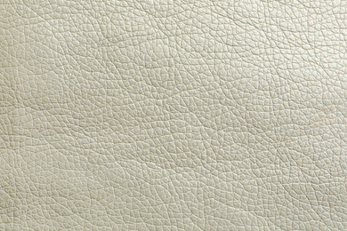 Photo of Texture of white leather as background, closeup