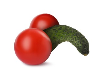 Cucumber and tomatoes symbolizing male sexual organs on white background. Potency problem