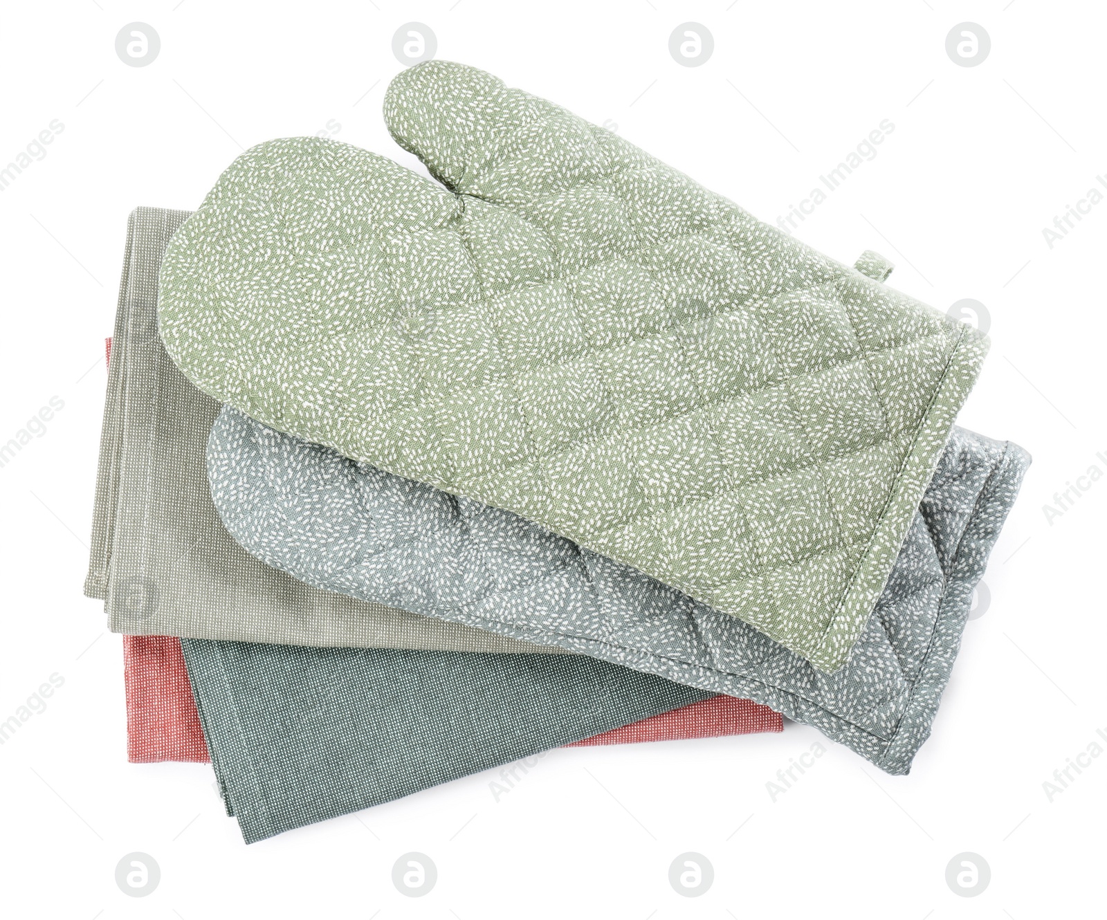 Photo of Kitchen towels and oven gloves for hot dishes on white background, top view
