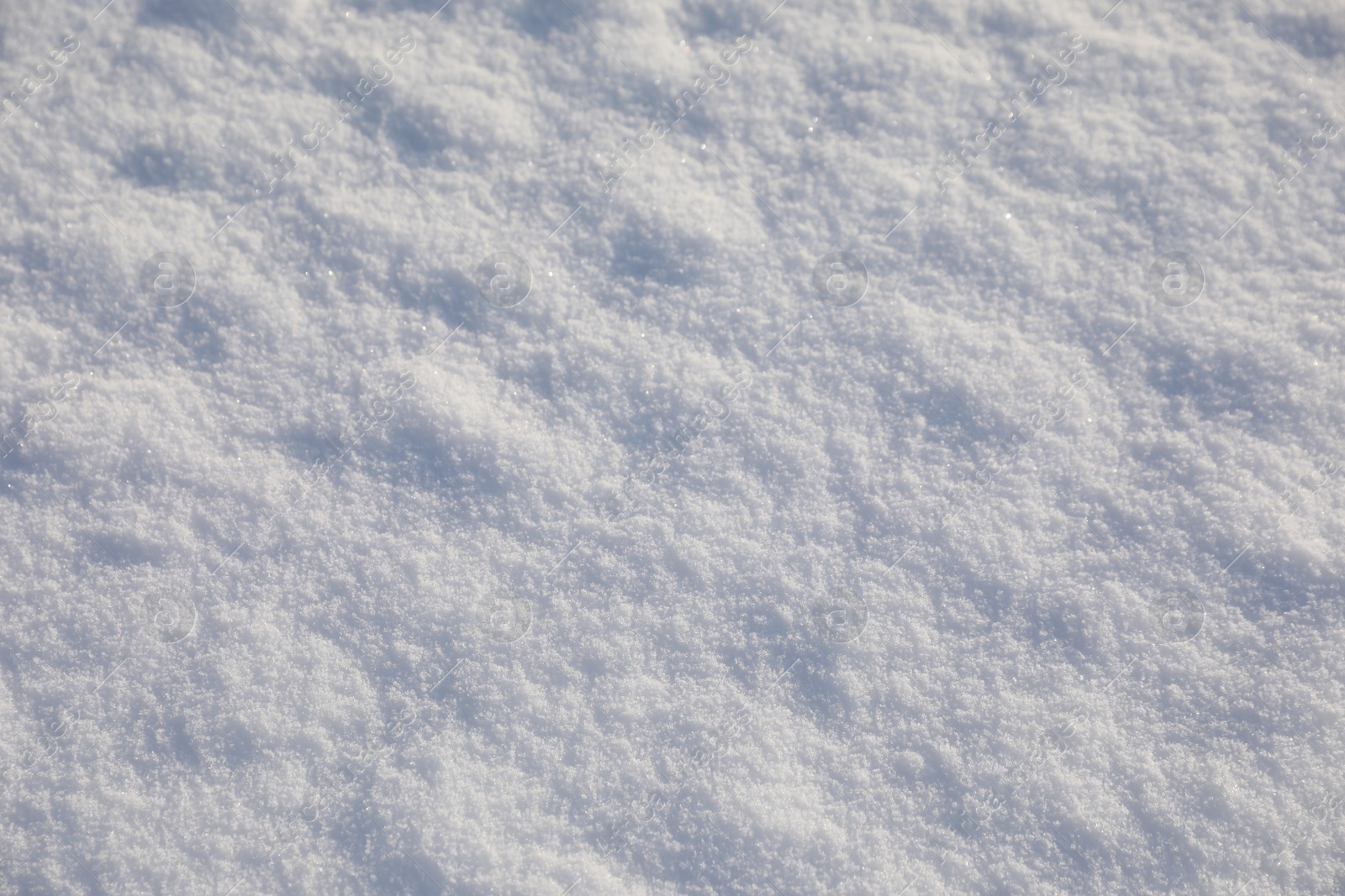 Photo of Beautiful white snow as background, closeup view