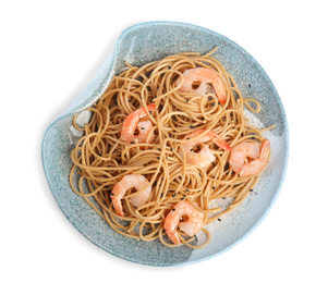 Plate of tasty buckwheat noodles with shrimps on white background, top view