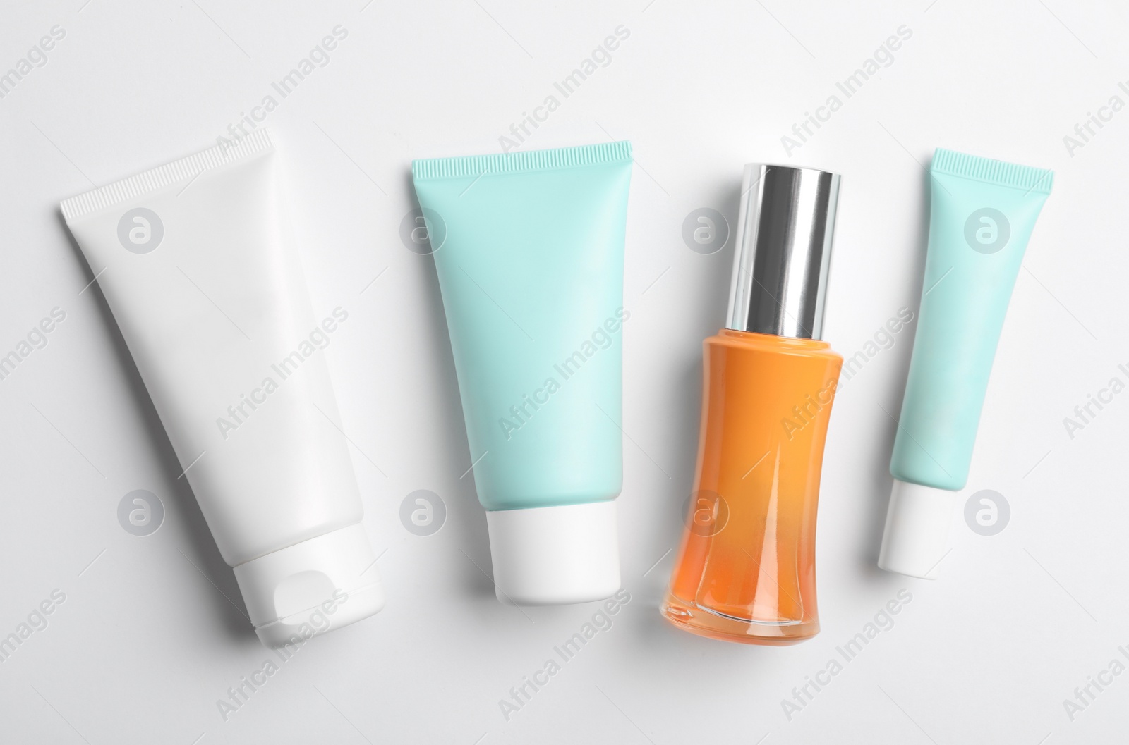 Photo of Set of luxury cosmetic products on white background, top view