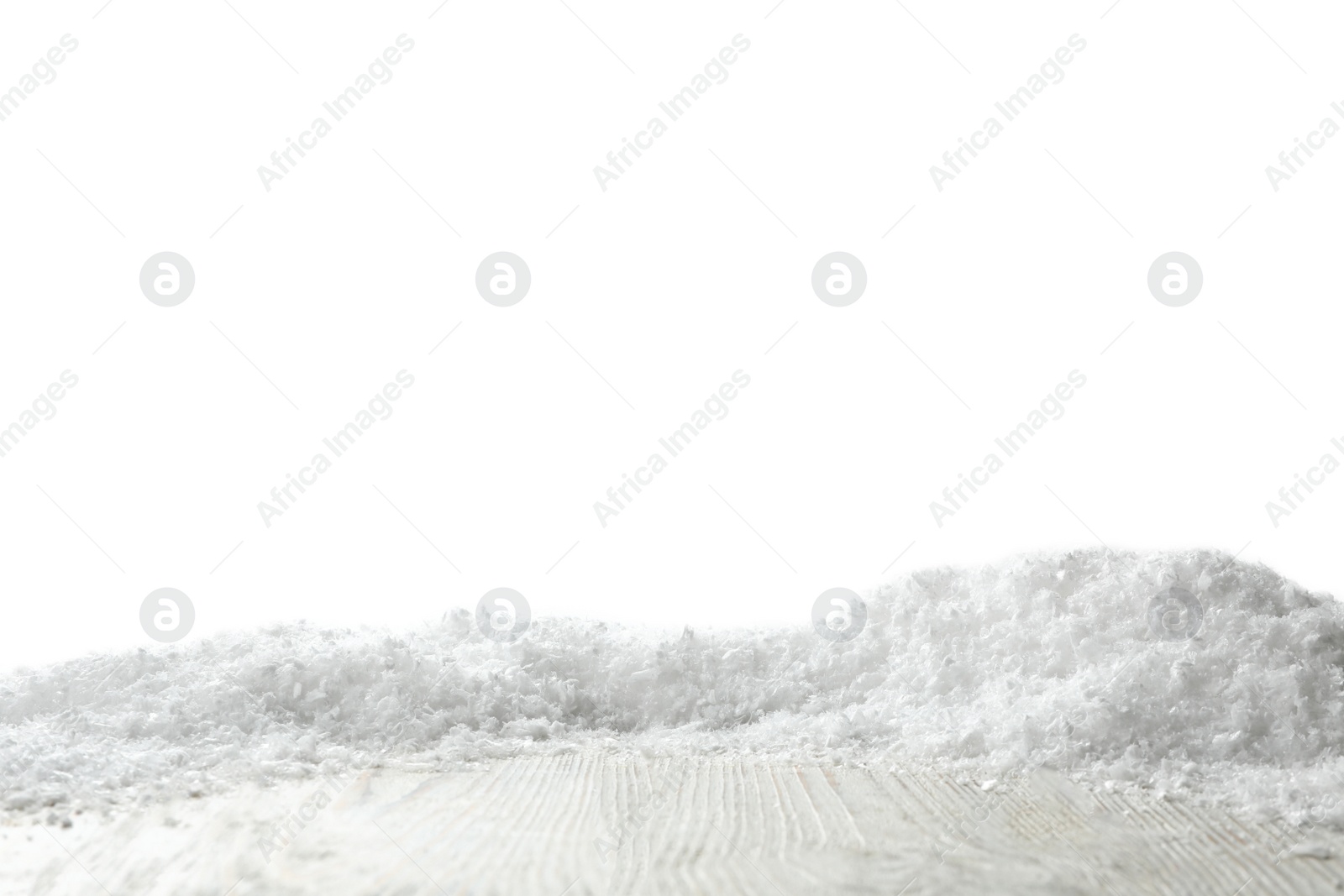 Photo of Wooden surface covered with snow against white background