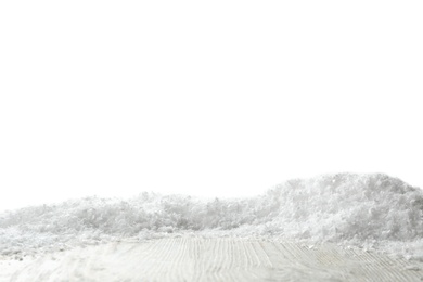 Wooden surface covered with snow against white background