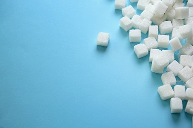 Refined sugar on color background