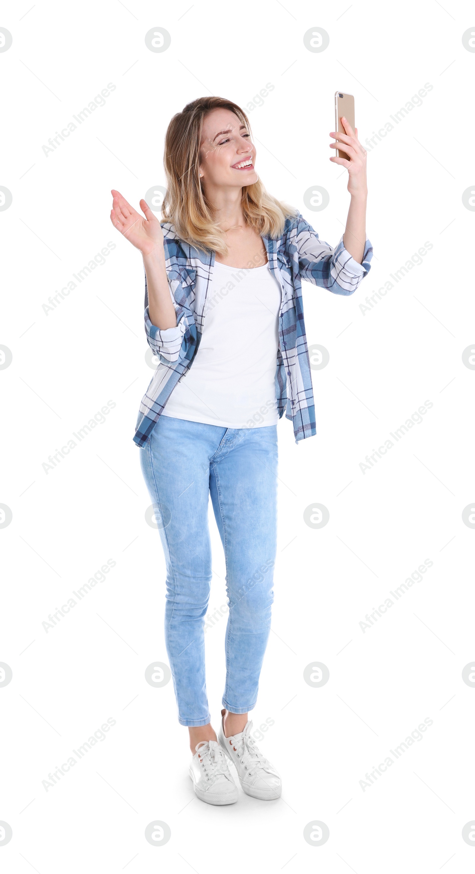 Photo of Woman using mobile phone for video chat isolated on white