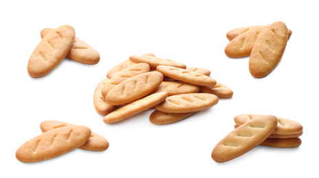 Image of Set of tasty crispy crackers on white background