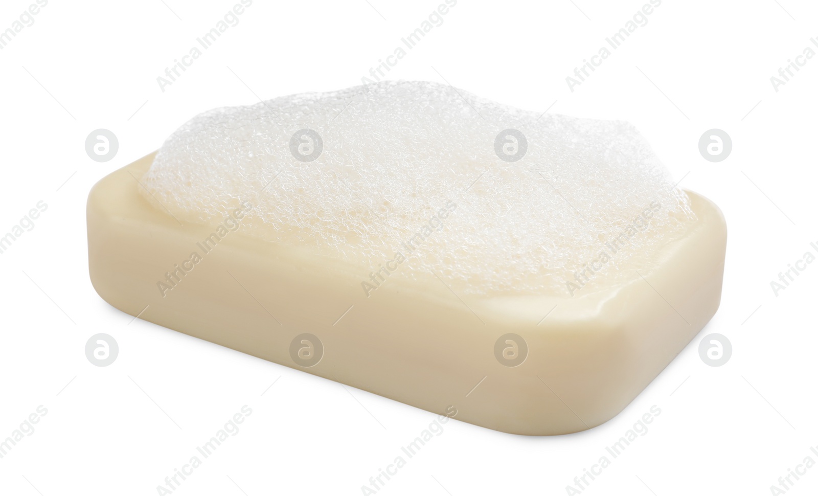 Photo of Soap bar with fluffy foam on white background