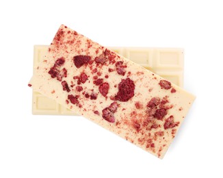 Chocolate bars with freeze dried raspberries on white background, top view