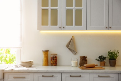 Modern kitchen interior with stylish white furniture