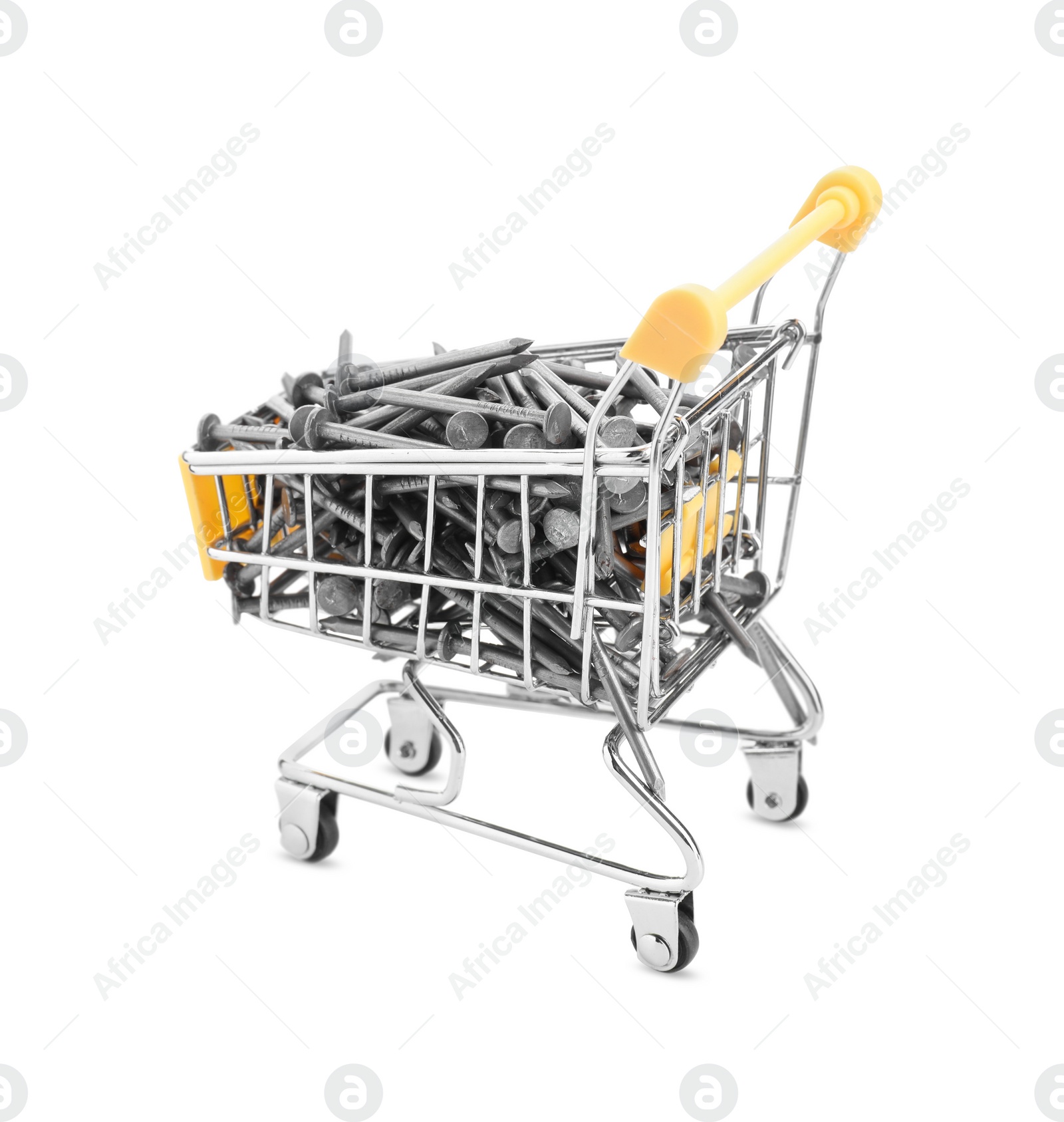 Photo of Metal nails in shopping cart isolated on white