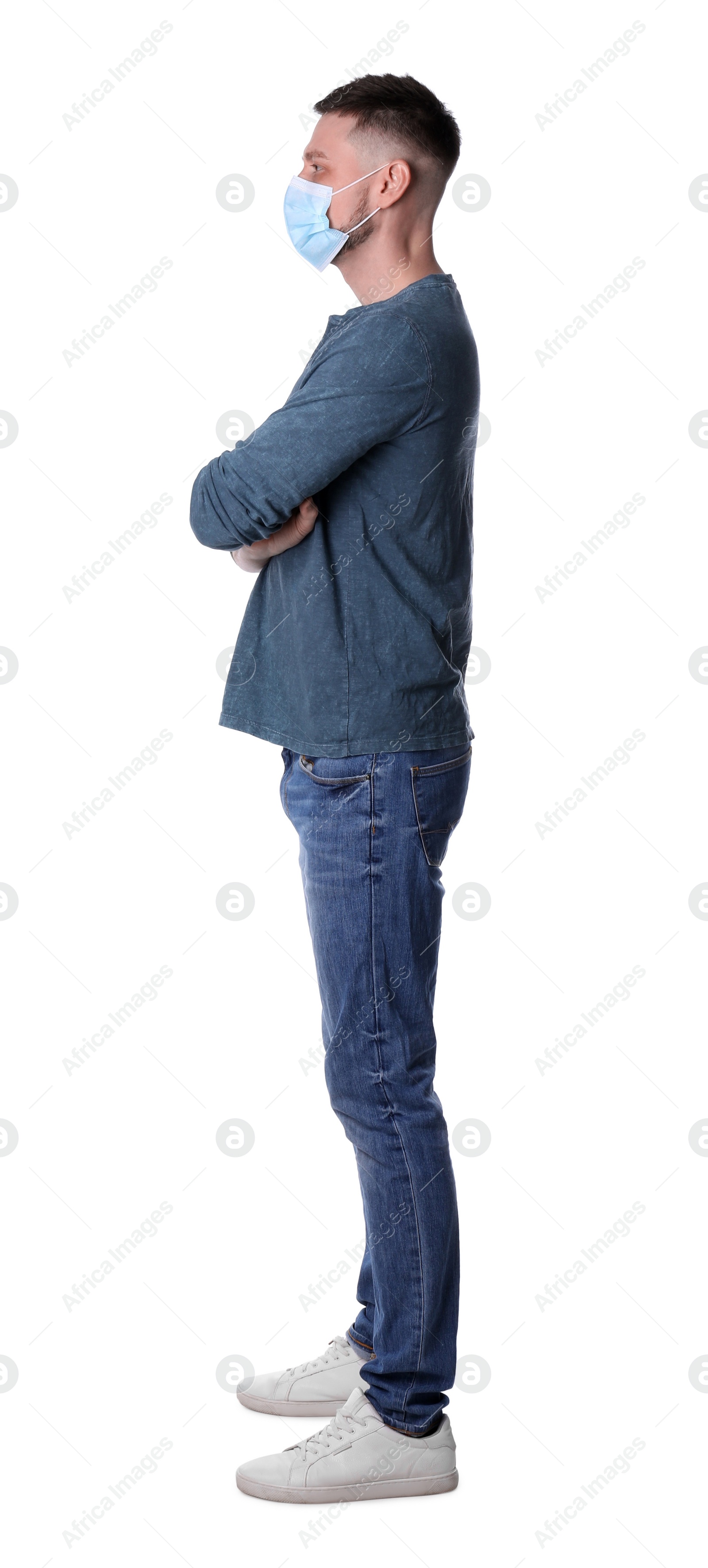 Photo of Man wearing protective mask in queue on white background