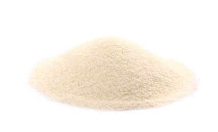 Photo of Pile of uncooked organic semolina isolated on white