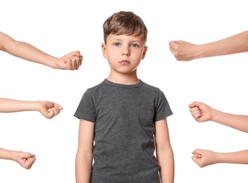 Photo of Kids with clenched fists and upset boy on white background. Children's bullying