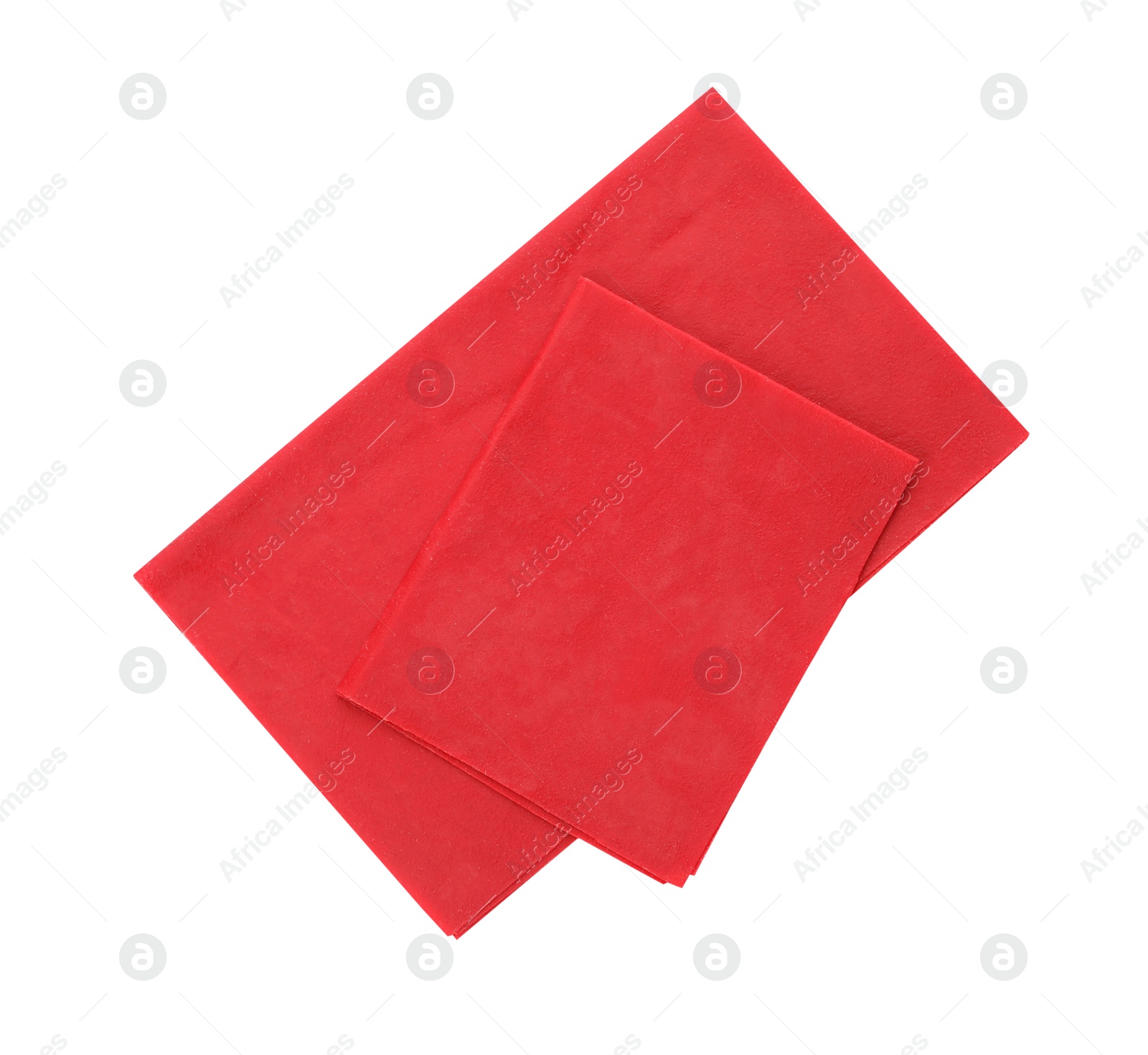 Photo of Red reusable beeswax food wraps on white background, top view