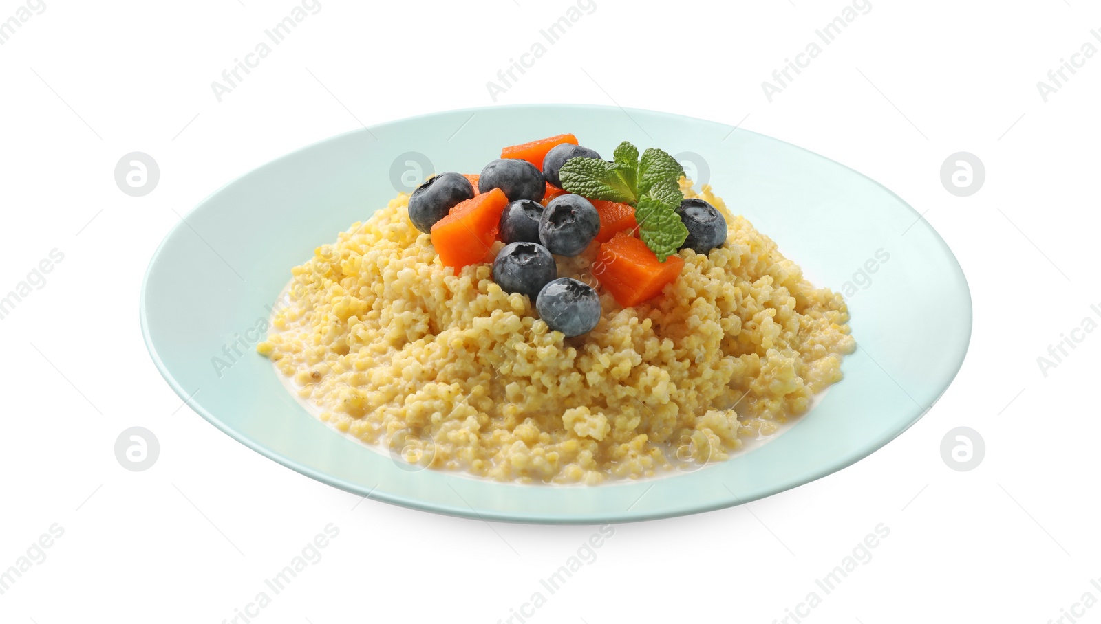 Photo of Plate with tasty millet porridge, blueberries, pumpkin and mint isolated on white