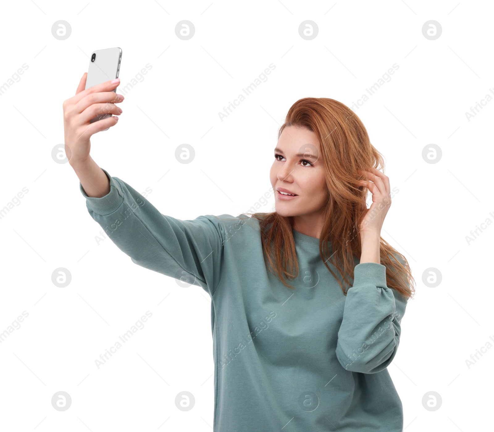 Photo of Beautiful woman taking selfie on white background