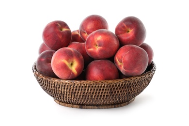 Photo of Basket of delicious ripe peaches isolated on white