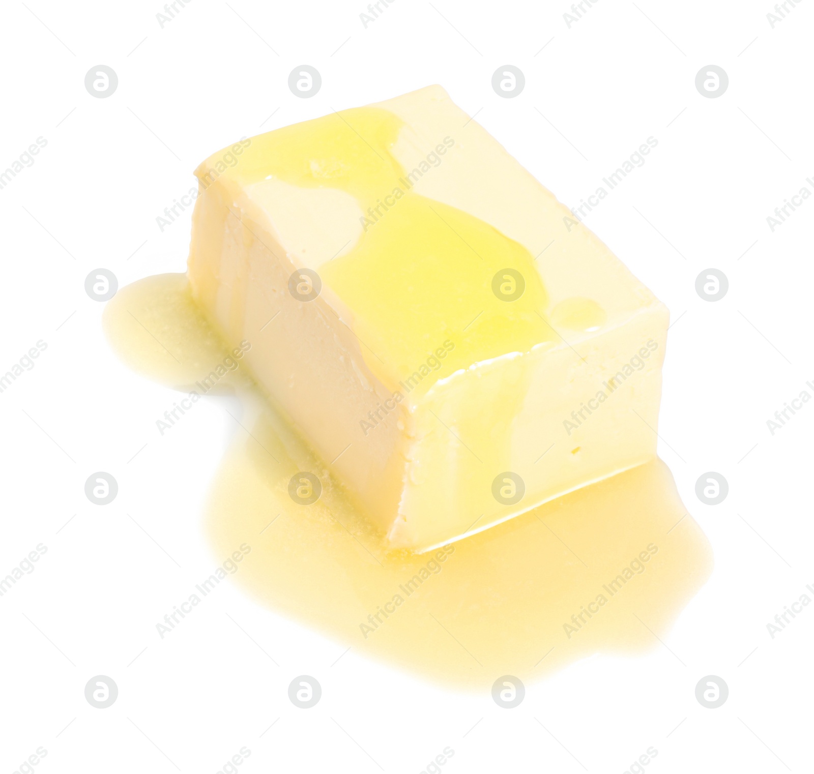 Photo of Piece of melting butter on white background